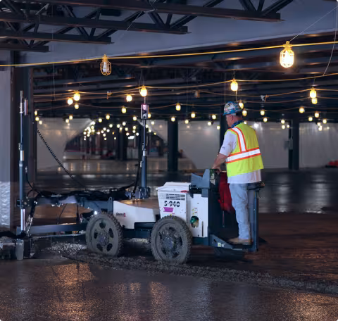 Man at work on laser screed