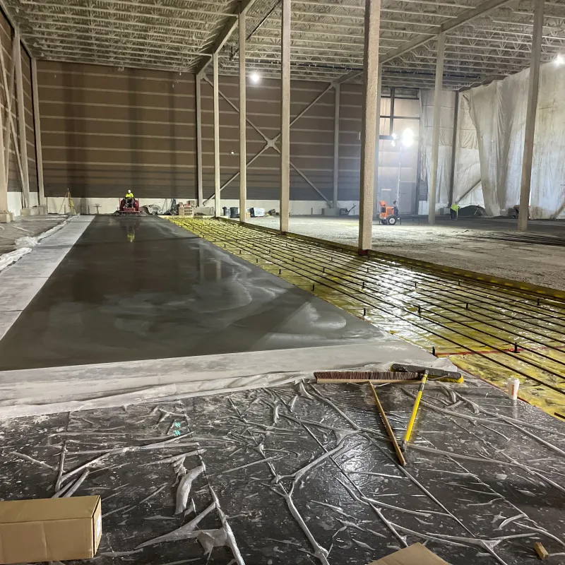 image of a dark polished concrete floor section